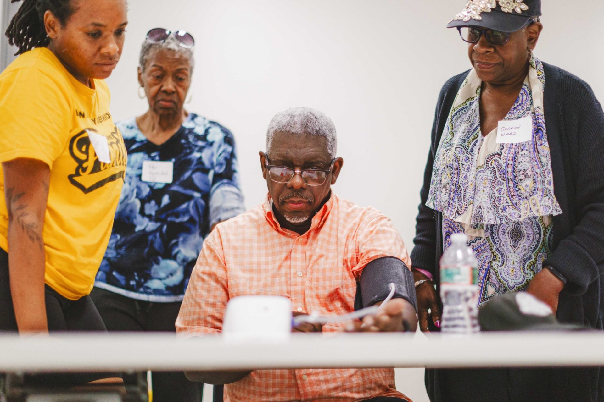 Have Faith In Heart training, practicing blood pressure screening together.