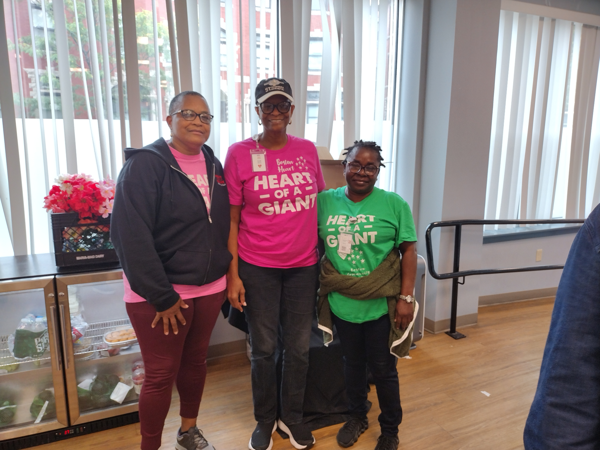 HGF staff and CHWs in Heart of a Giant tees, September 2024.